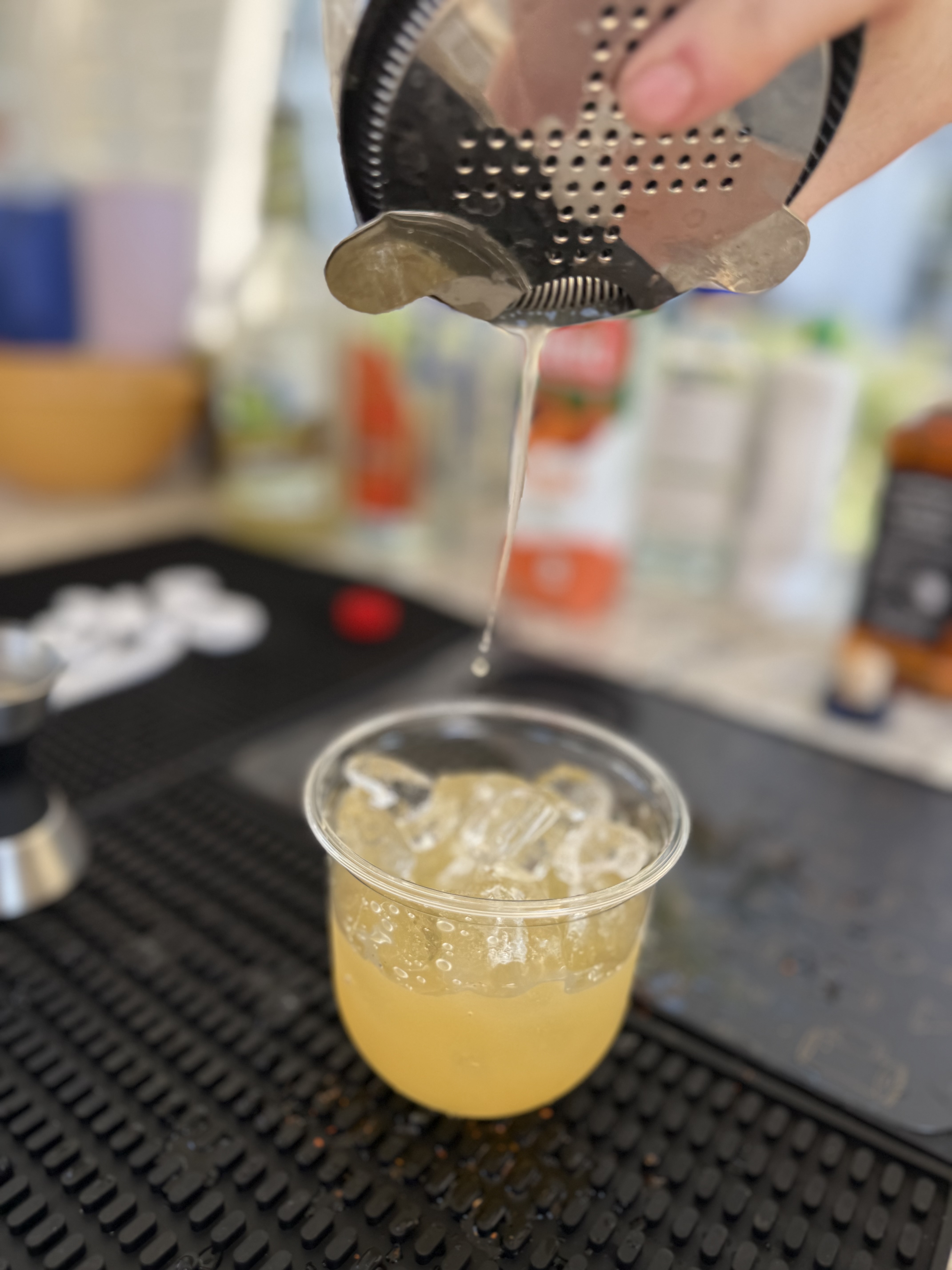 Cocktail being poured