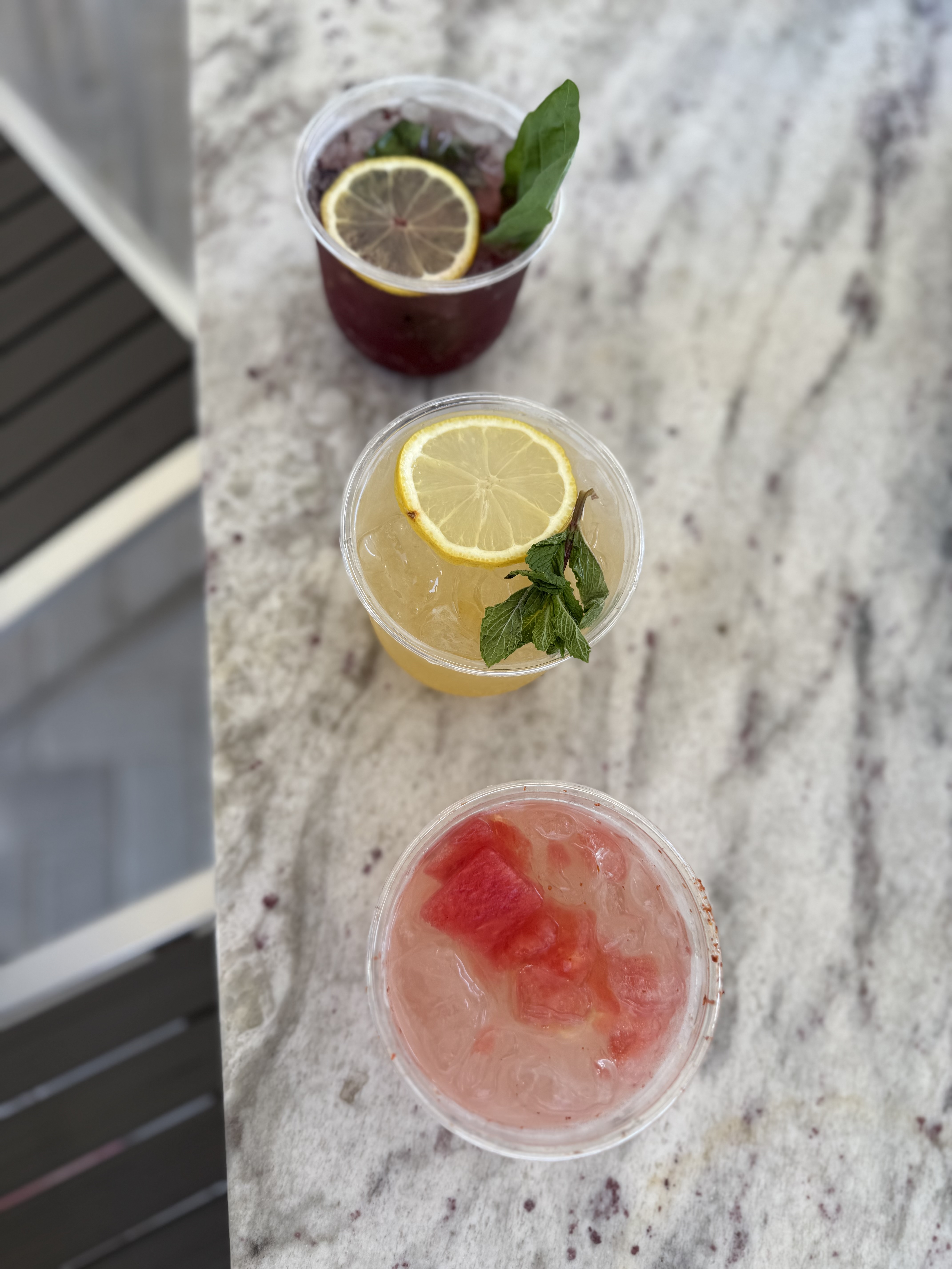 Three cocktails overhead